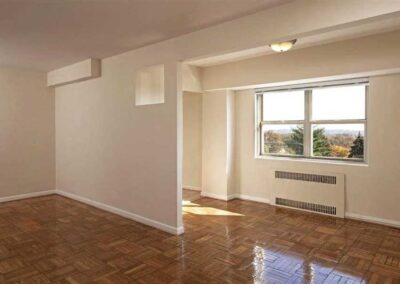 View of living and dining area in an unfurnished apartment at Skyline Towers